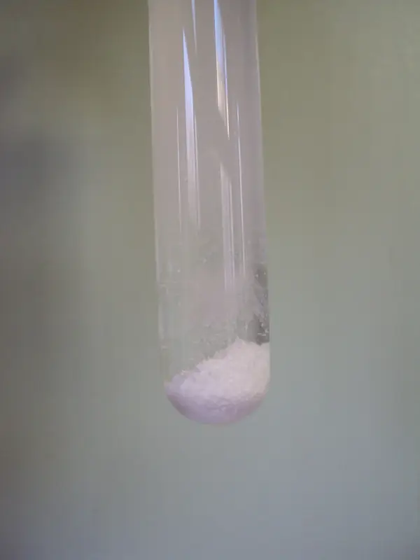 White silver chloride precipitate in a test tube