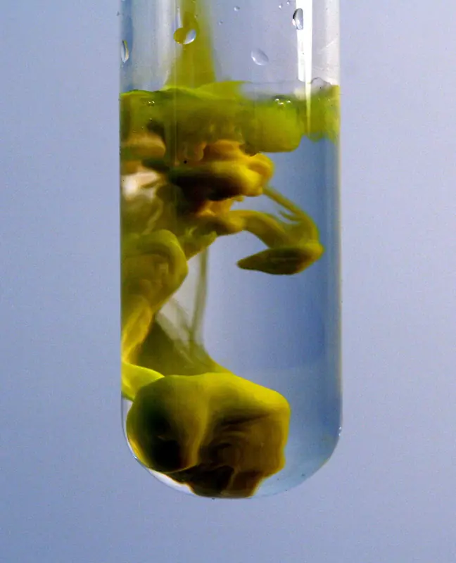 Yellow lead iodide precipitate forming in a test tube